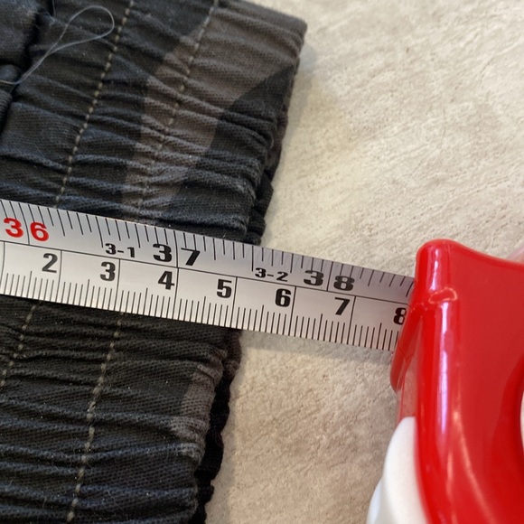 Black camo pants. New. No tags. 2 side pockets. Elastic at ankles. 1 pocket back - Picture 4 of 4